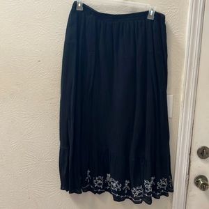Kimmotion NY maxi skirt with white embroidery design on the bottom of the skirt